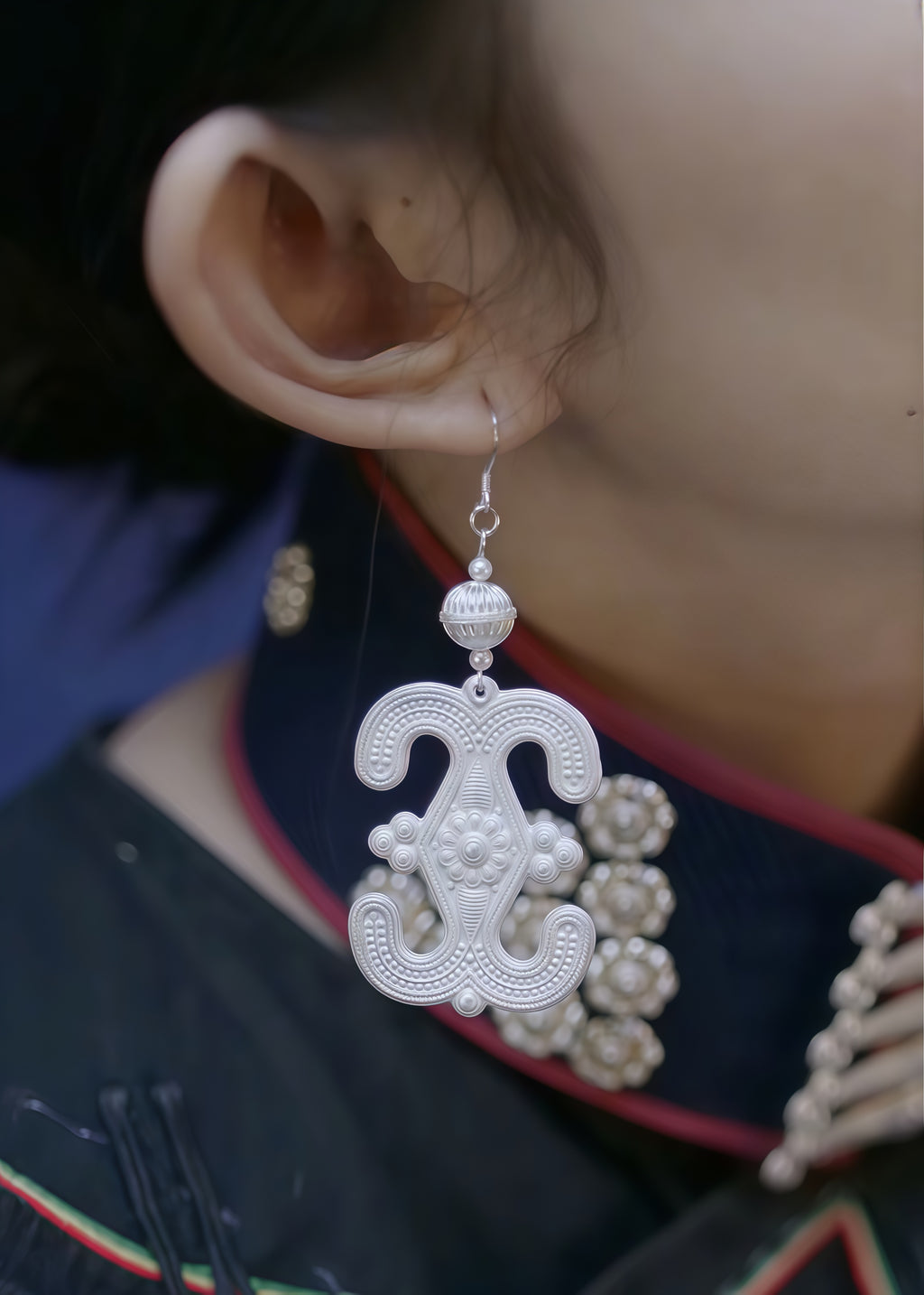 Silver earrings with traditional patterns